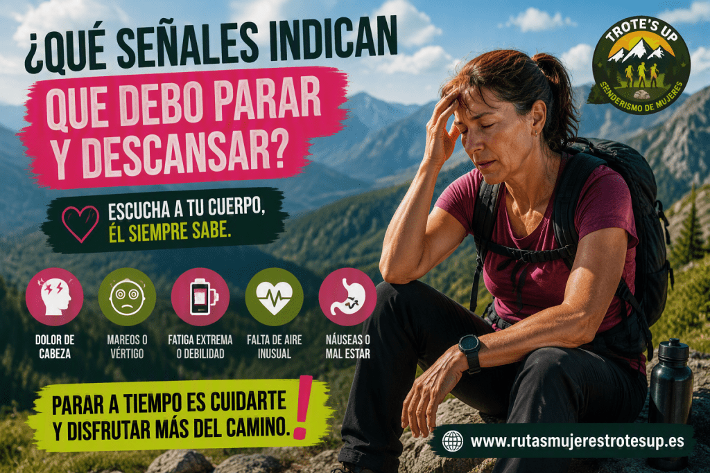 ¿Qué señales indican que debo parar y descansar durante una ruta? Mujer senderista descansando durante una ruta de montaña para recuperar energía y continuar con seguridad.